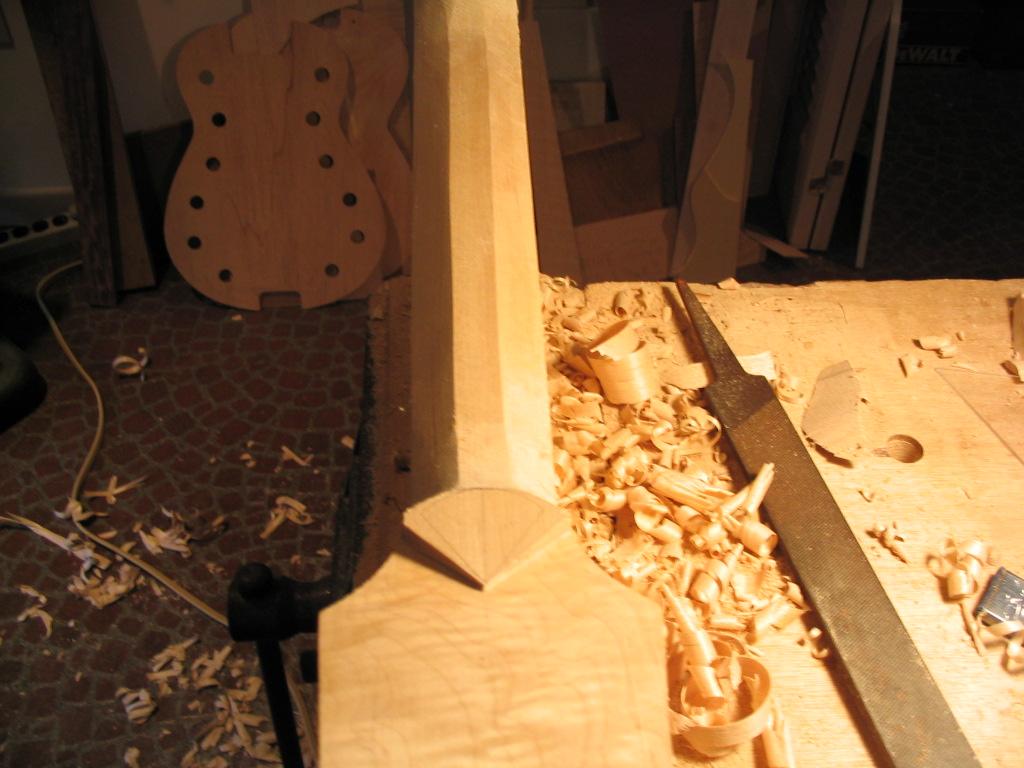 carving a guitar neck